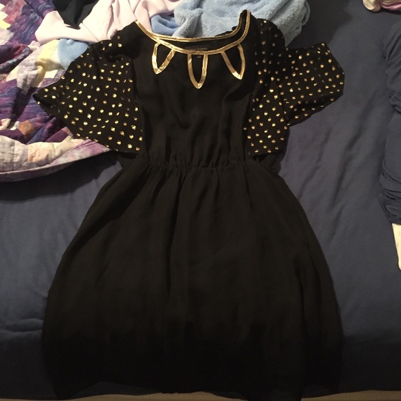 Gold and black cape dress