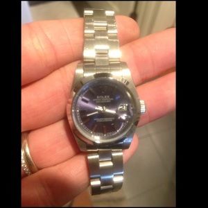 Stainless steel watch purple face