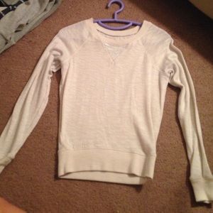 Long sleeve white top. Fits like small or medium