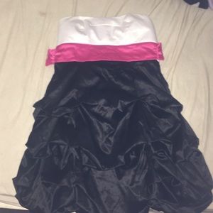 Ruffled pink, black, and white winterfest dress.