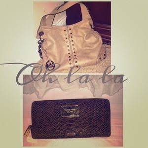 Michael Kors handbag, and brown wallet