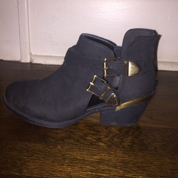 Super cute black booties with gold buckles!