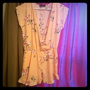 Peach colored floral romper