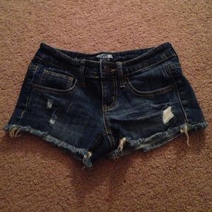 Destroyed dark wash short shorts