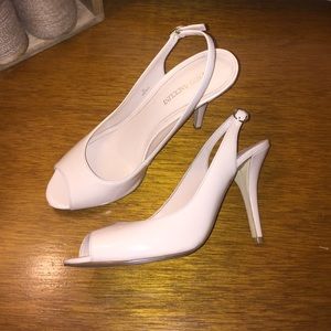 Nude patent leather sling back pumps