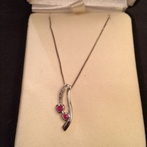 Sterling silver necklace with chain.