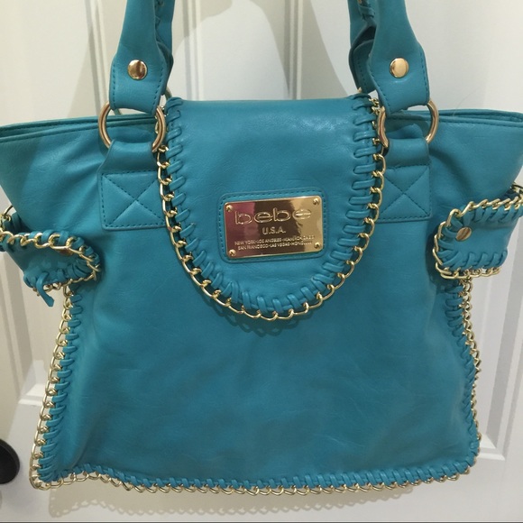 Bebe Aqua color purse slightly used