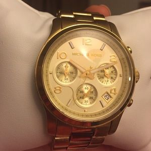 Authentic gold Michael Kors "runway" watch