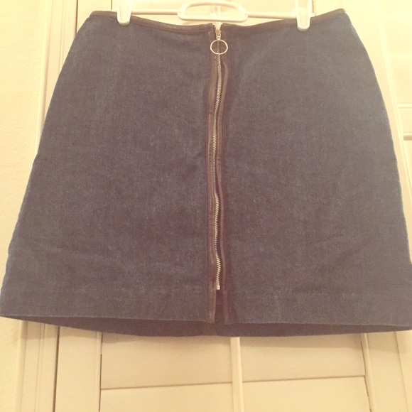 Denim skirt with brown trim and front zipper
