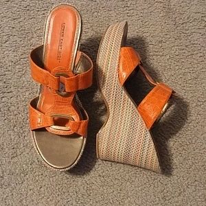 Orange wedge heels