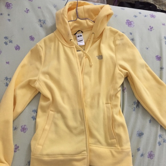 Yellow north face zip up sweater