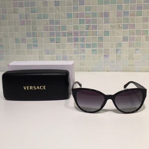 Versace Vanitsas 58 mm cat eye sunglasses.