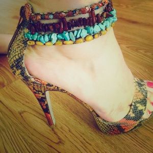 Size 9 Paprika brand heels.