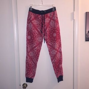 Red and white bandana print joggers.