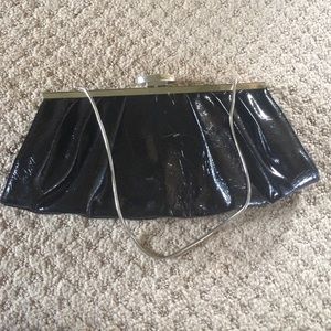 Clutch w strap; beautiful purple inside