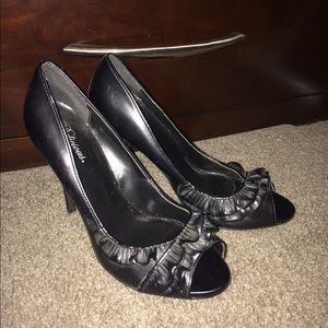 Delicious black peep toe pumps
