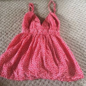 Adorable cross-back peplum top