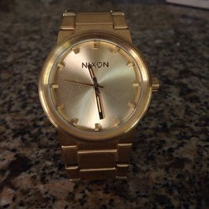 Gold Nixon 100 m stainless steel watch