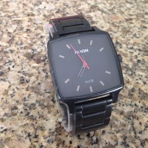 Black 100 m stainless steel Nixon watch