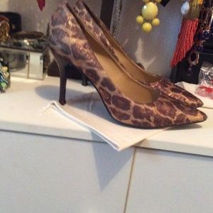 Nine West leopard pumps.