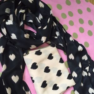 Heart print scarf selling both as a pair.