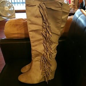 Grey fringe knee high boots