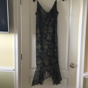 Black and gold calf length dress. 100% silk