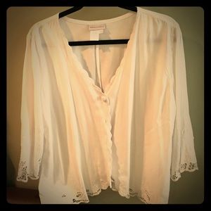 Flowy white blouse with lace sleeves and trim