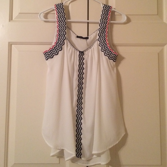 White top with navy & red embroidery