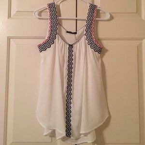 White top with navy & red embroidery