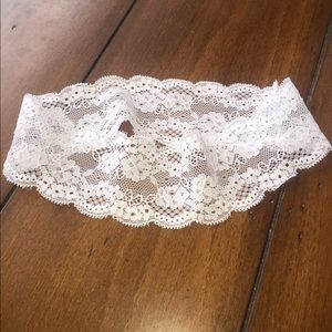 Hand stitched white lace headband.