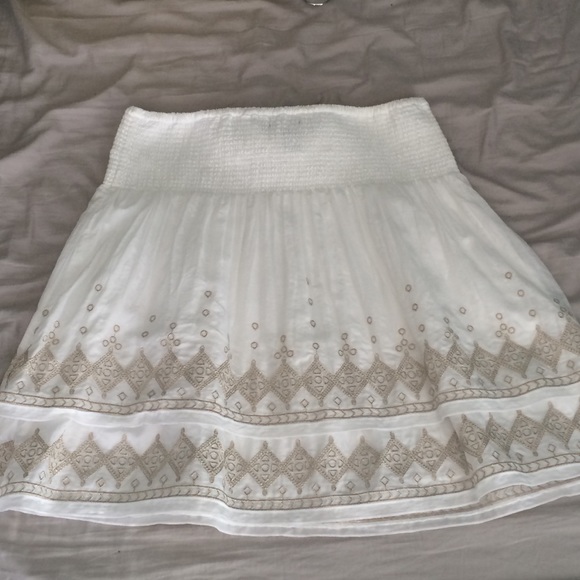 White skirt with gold embellishments