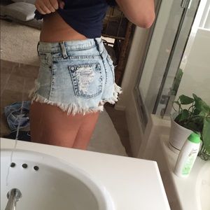 High waisted fringe denim shorts