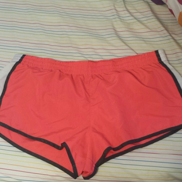 Pink and white running shorts