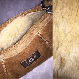UGG Authentic barrel shaped handbag.