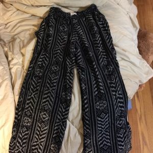 Billabong black and white tribal design flares