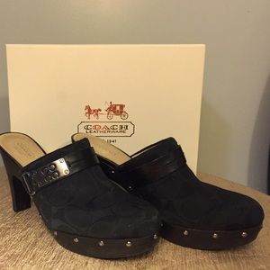 Size 9 Coach clogs, with box. Black