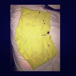 Yellow ripped high waisted shorts