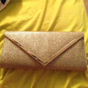 Call It Spring gold sparkly clutch