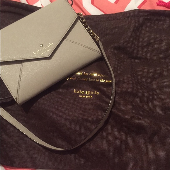 Kate spade small crossbody purse and dust bag.