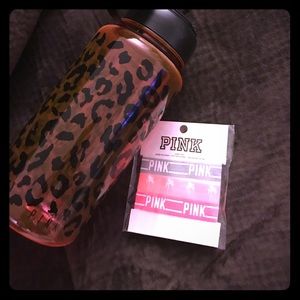 NWT pink Hair Ties and Bottle!
