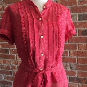 Sheer short sleeve top it a tie at the waist.