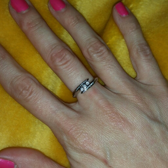 Additional pictures of size 5 diamond ring.