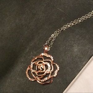 Lia Sophia rose gold flower necklace.