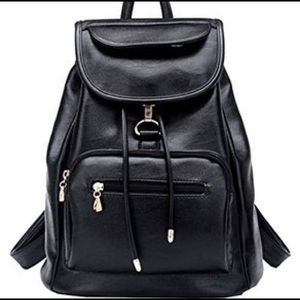 An adorable black vintage leather backpack
