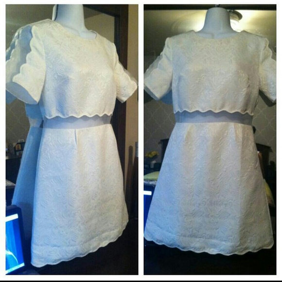 New with tags white dress with sheer slits