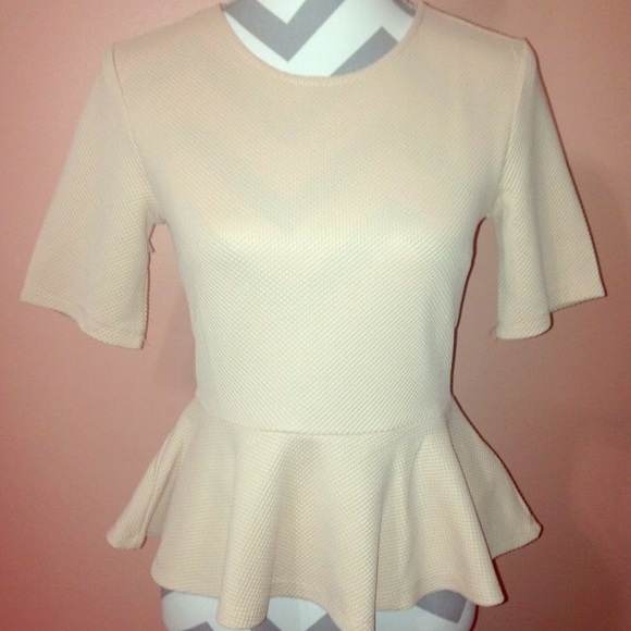 Peplum top in blush pink - Picture 1 of 2