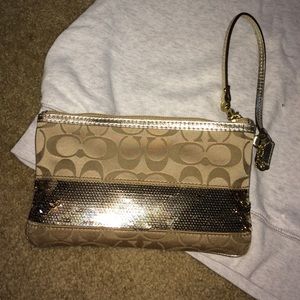 Gold coach wristlet with sequins!