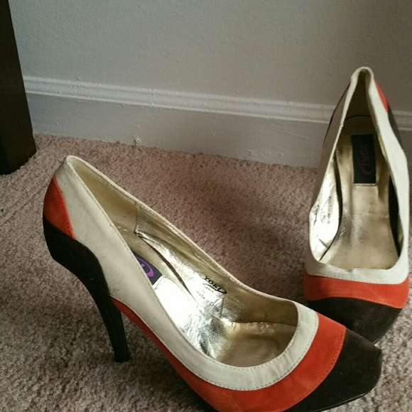 Multi color high heel shoes...never worn.