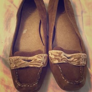 Moccasin style flats.